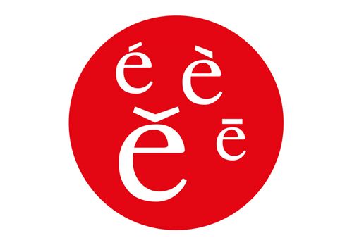 ein roter Kreis mit weißen Buchstaben darauf