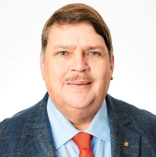 eine Person in Anzug und Krawatte